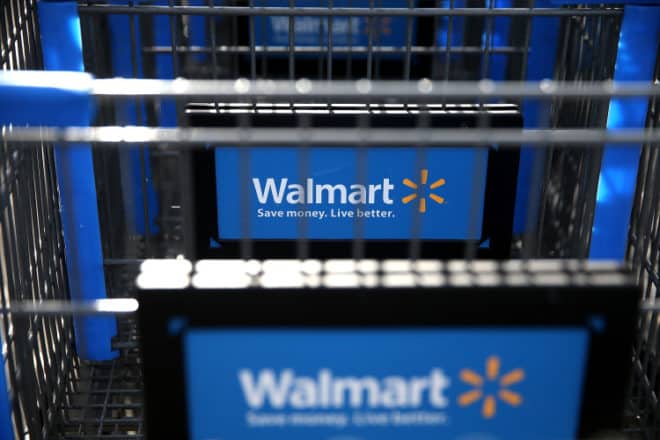 SAN LORENZO, CA - FEBRUARY 20:  Wal-Mart shopping carts sit outside of a store on February 20, 2014 in San Lorenzo, California. Wal-Mart reporterd a 21 percent decline in fourth quarter earnings with profits of $4.4 billion or $1.36 a share compared to $5.6 billion, or $1.67 per share one year ago.  (Photo by Justin Sullivan/Getty Images)