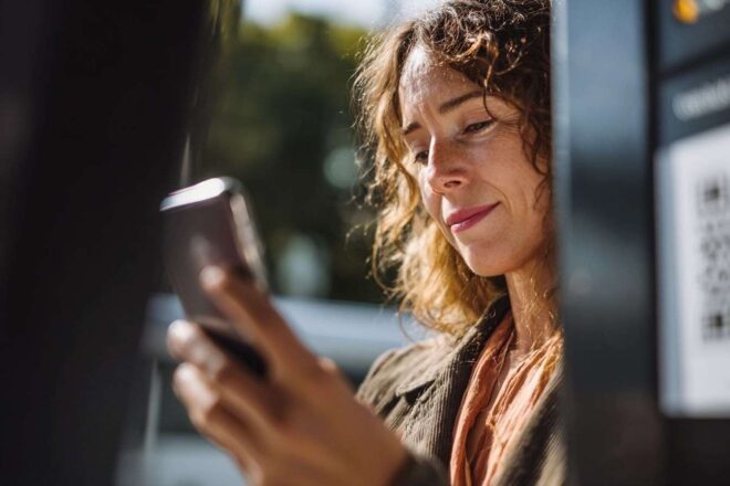 Customer scanning qr code at parcel dropoff