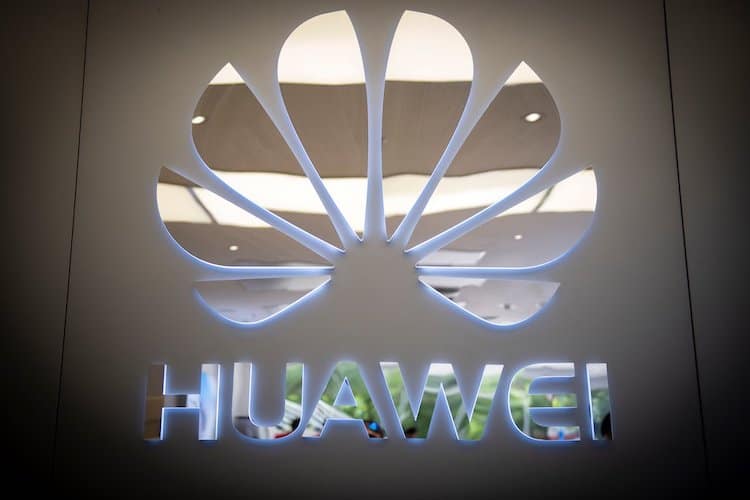A Huawei logo is displayed in a store in Beijing on May 21, 2019. - Huawei founder Ren Zhengfei on May 21 shrugged off US attempts to block his company's global ambitions, saying the United States underestimates the telecom giant's strength. (Photo by Nicolas ASFOURI / AFP)