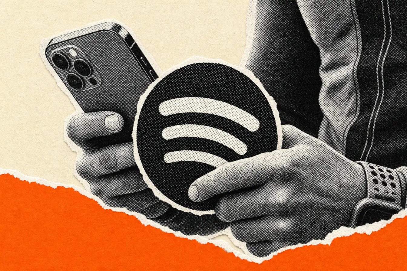 Mains de coureur serrant Spotify et iPhone