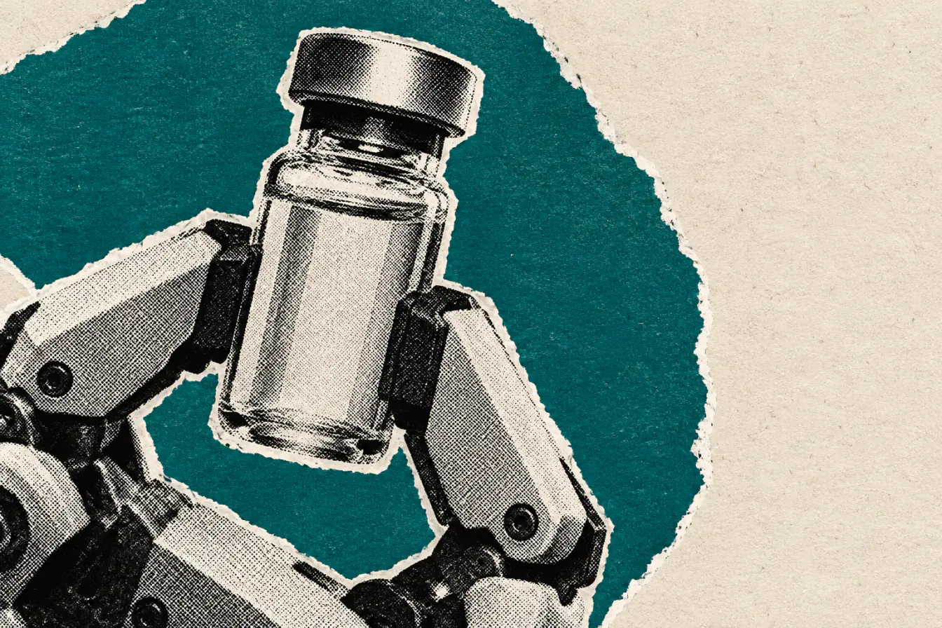 Fiole saisie par une pince robotique